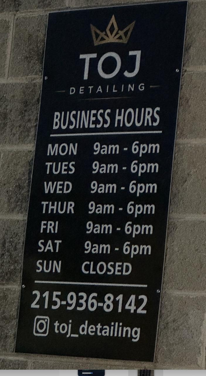 TOJ Detailing business hours sign